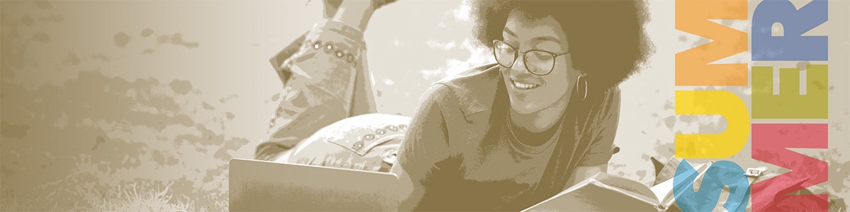 a woman laying on grass 