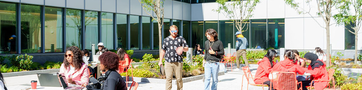 Students outside in the BHCC courtyard Students outside in the BHCC courtyard 
