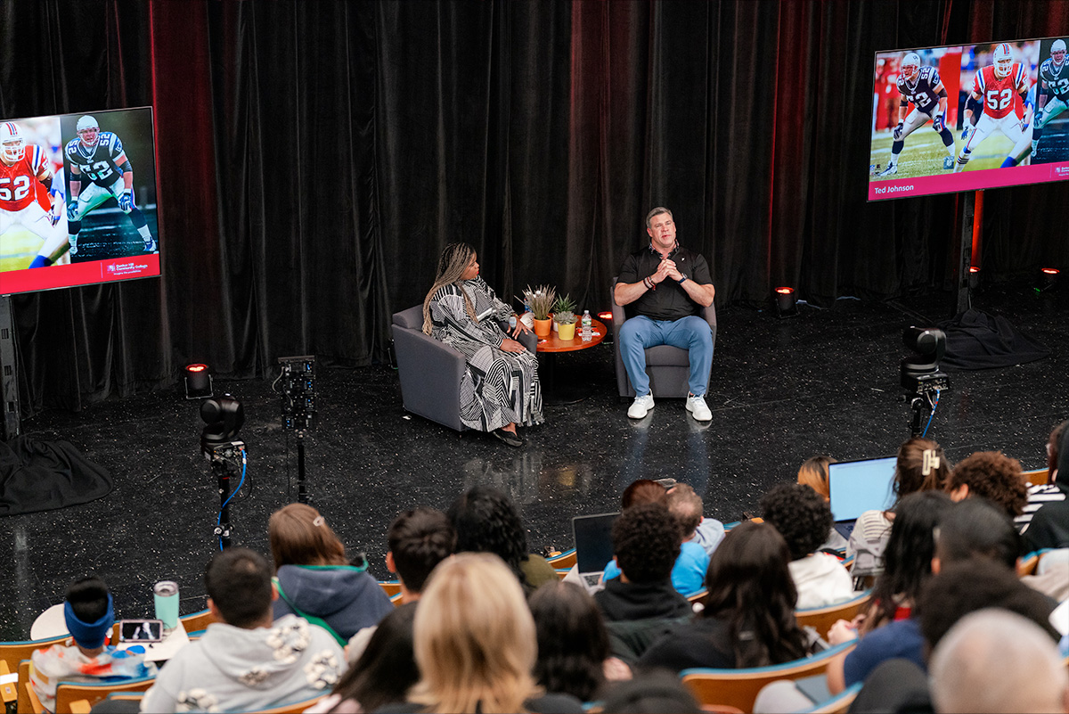 Ted Johnson being interviewed on stage by Nahomi