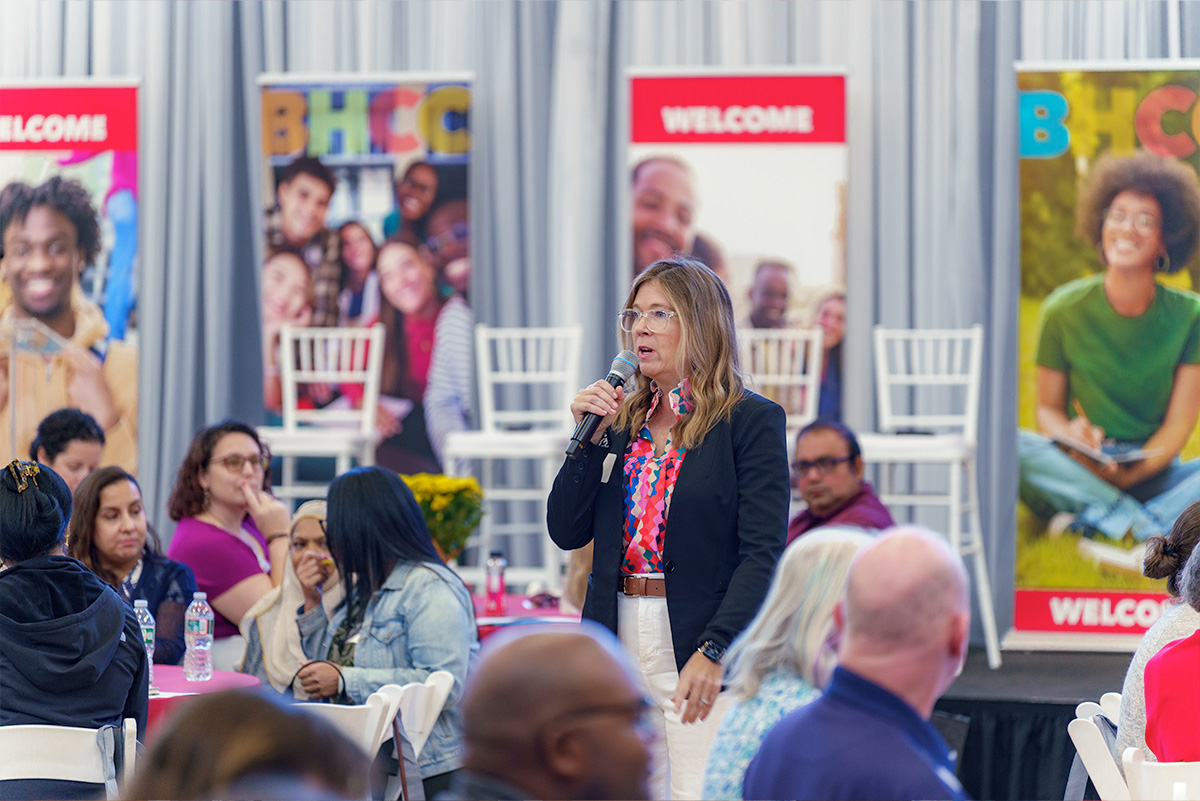 presenter on stage at convocation