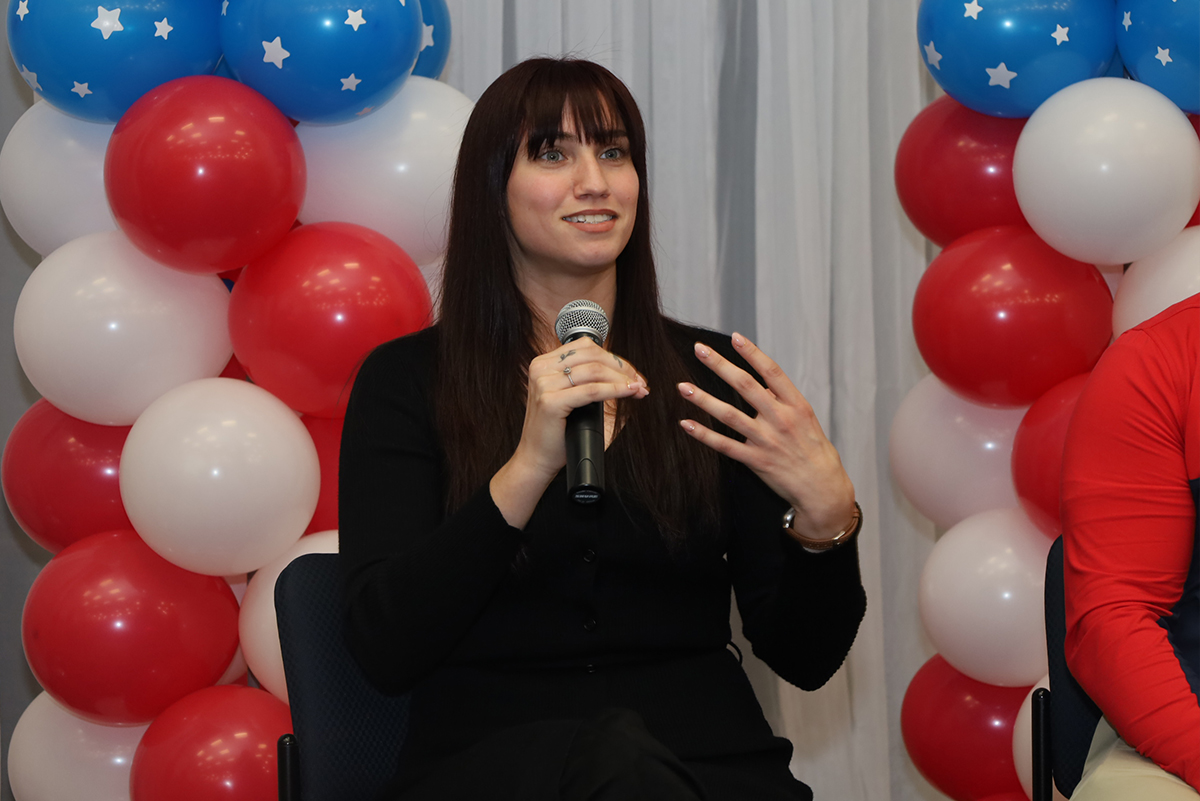 speaker infront of balloons