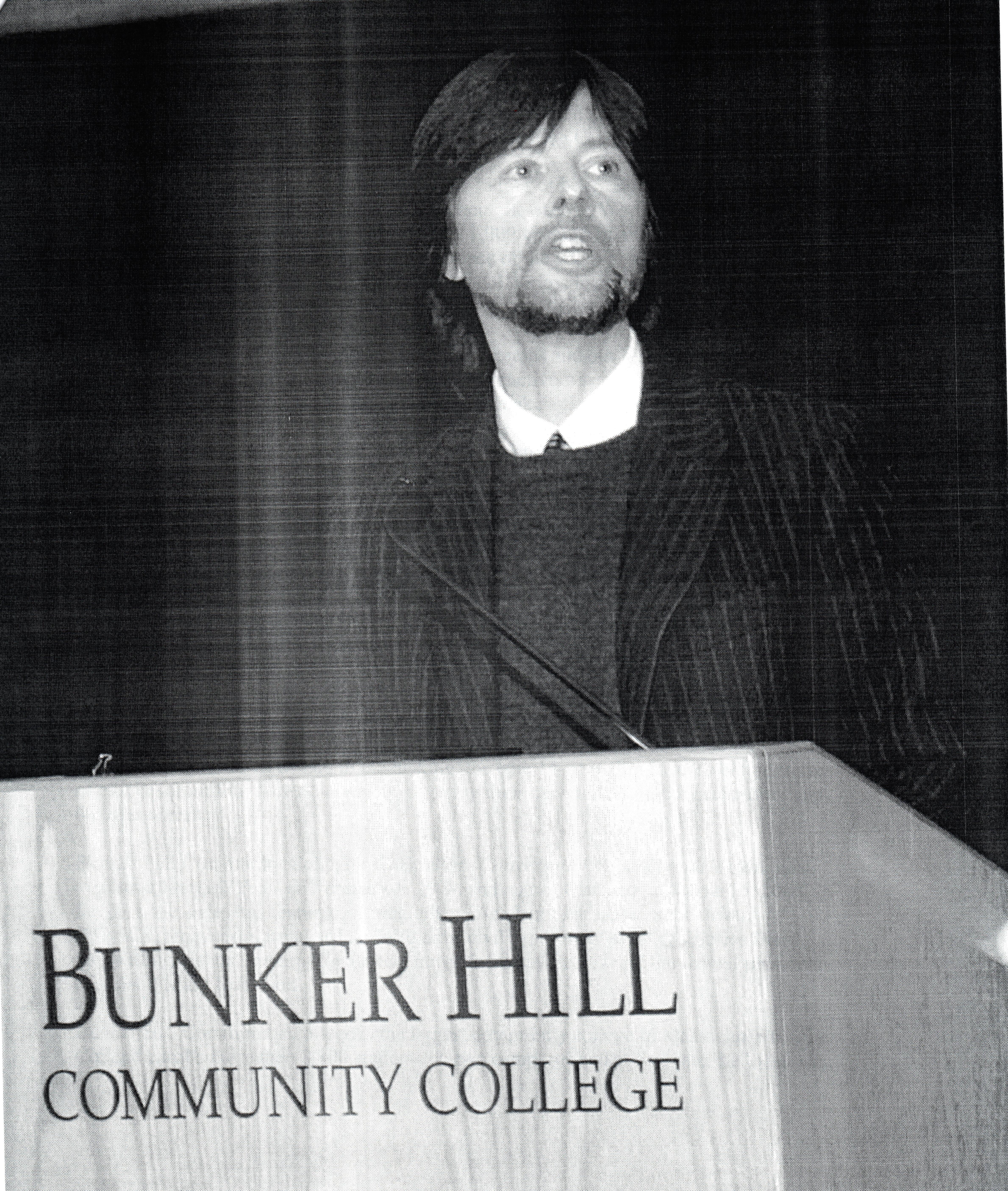 Burns_Picture07.jpg - Black and White Photo of Documentarian Ken Burns speaking at Bunker Hill Community College