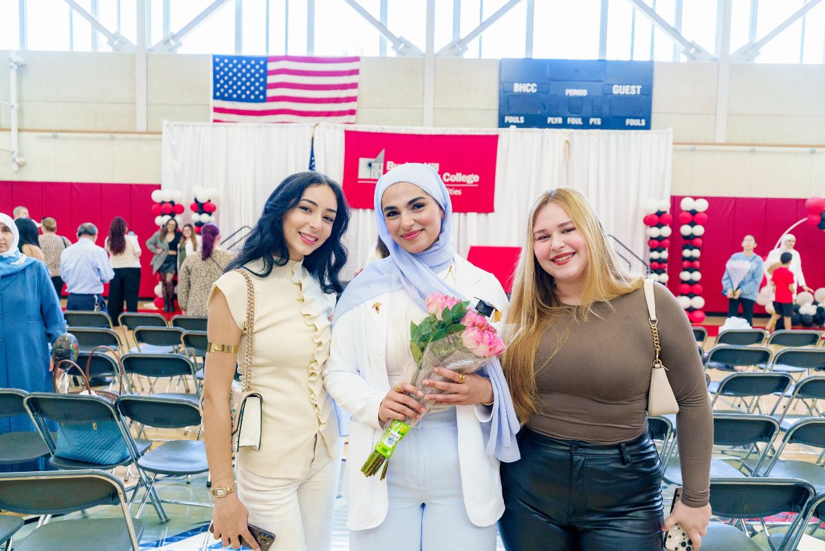 Student and family posing