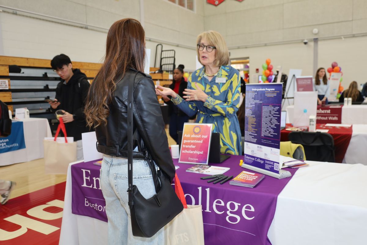 College rep speaking to a student
